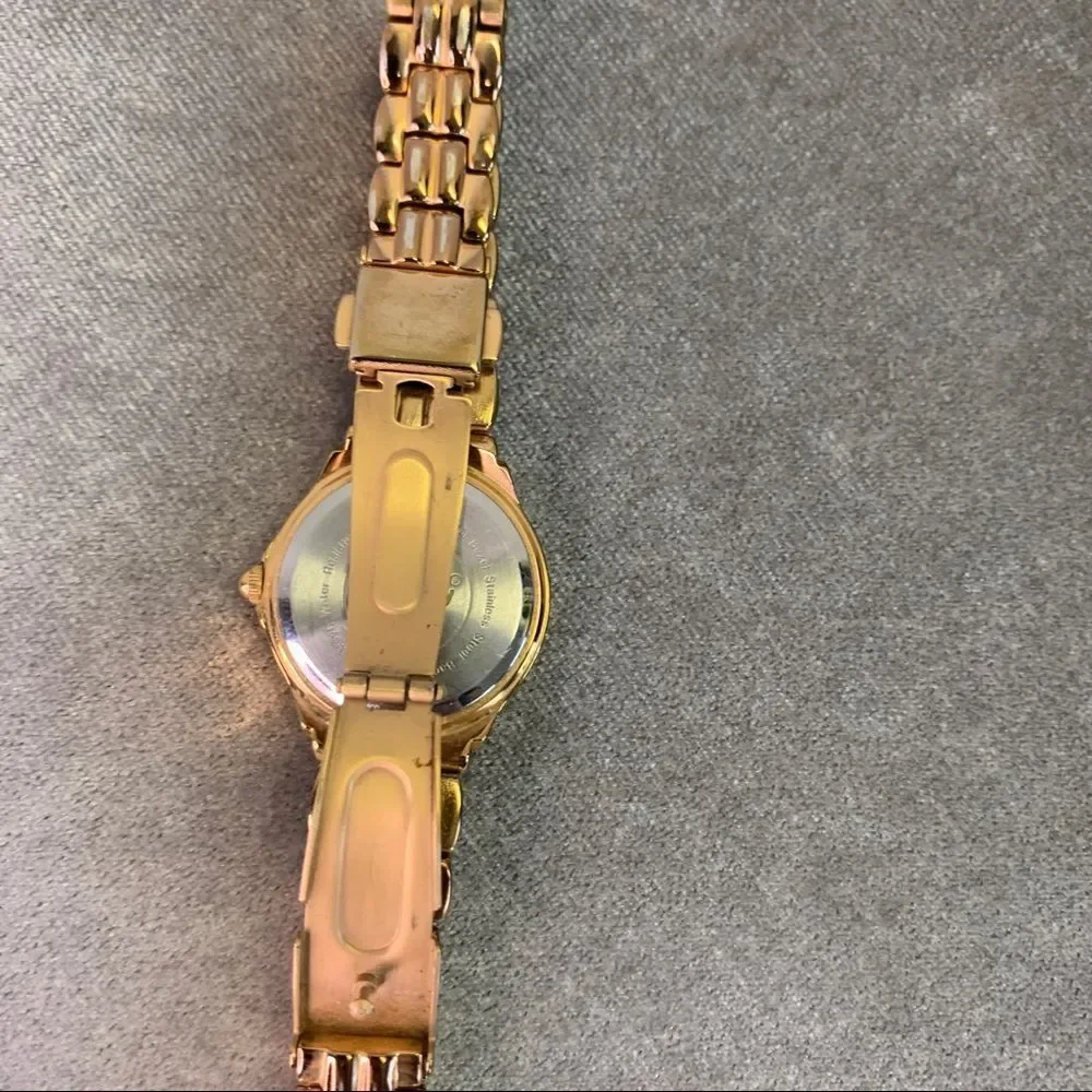 Armitron Now Gold-tone round mother of pearl face Quartz Watch
